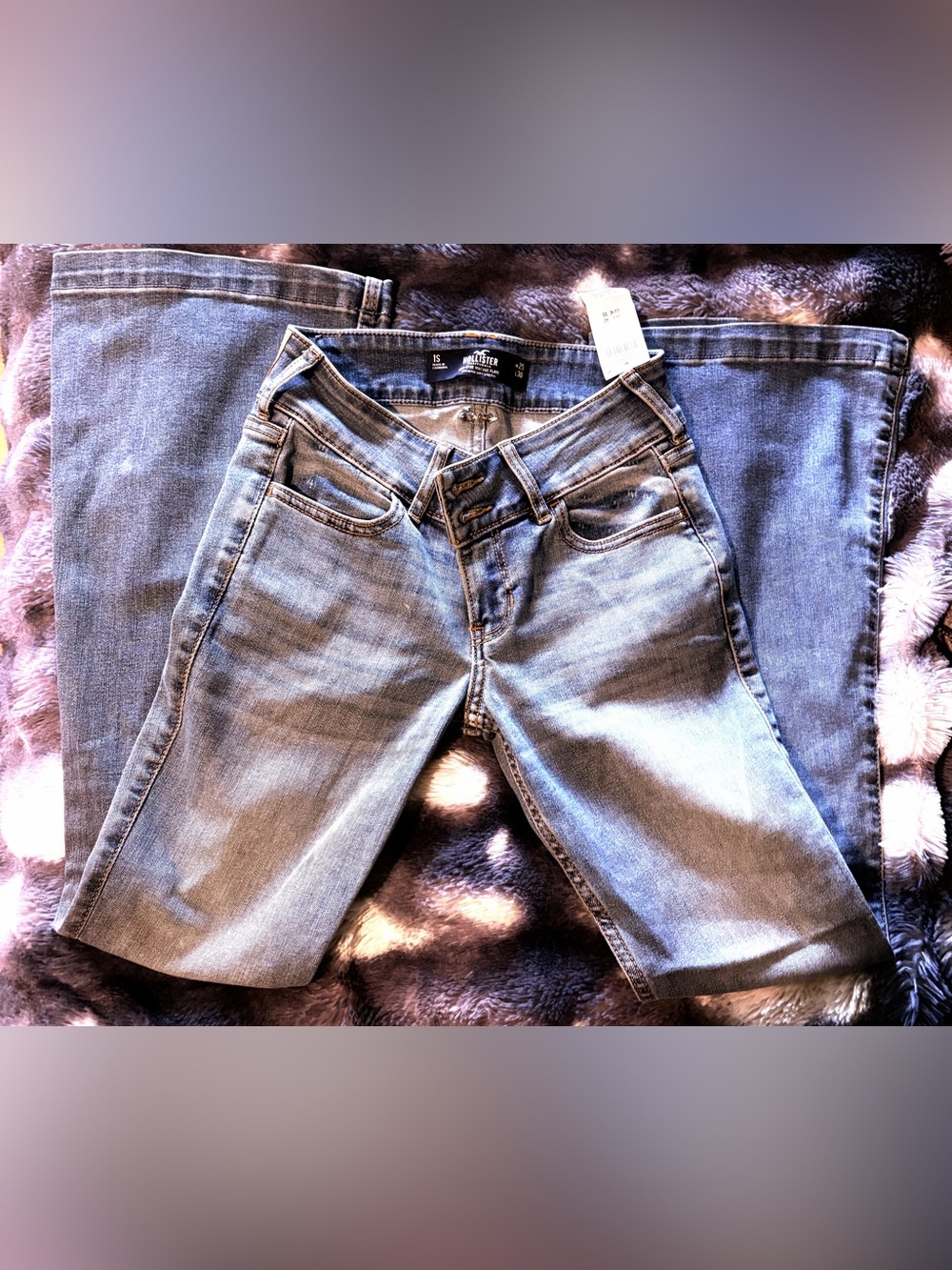 Hollister Vintage Low-Rise Flare Denim in Medium Blue